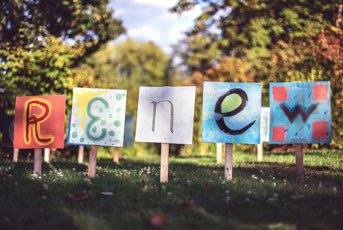 R E N E W on paper signs